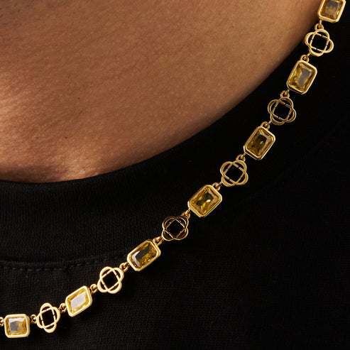 Collier trèfle à pierres précieuses jaunes 