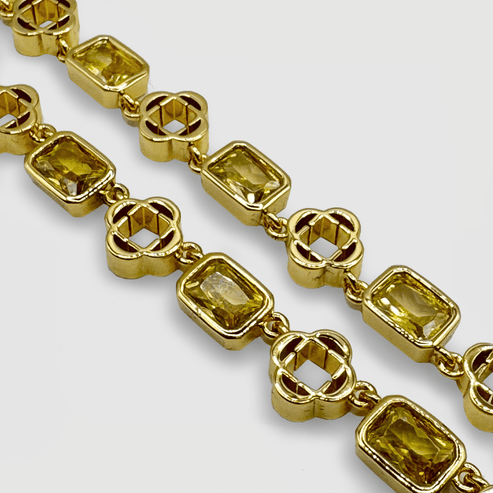Collier trèfle à pierres précieuses jaunes 
